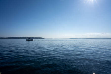 tour boat cutting across the puget sound in seattle washingtonの写真素材