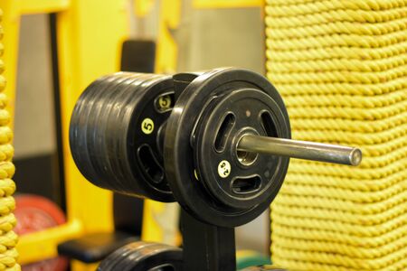 Sports equipment in gym. Dumbbells of different weight close upの写真素材