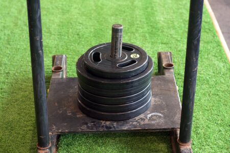 Sports equipment in gym. Dumbbells of different weight close upの写真素材