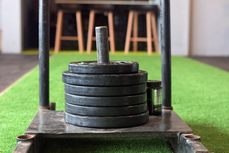 Sports equipment in gym. Dumbbells of different weight close upの写真素材