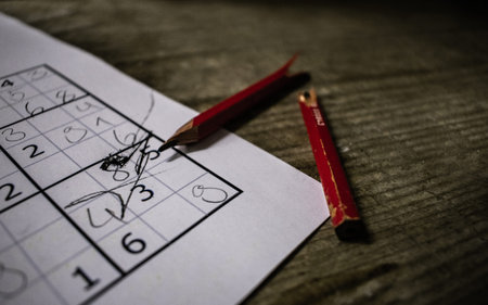 The broken lead pencil on the calendar shows the concept of planning and management. Selective focus on paper and pencil.の写真素材