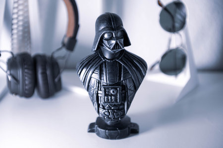 Darth Vader bust from the popular Star Wars film. 3D printed statue in dramatic dark lightning.のeditorial素材