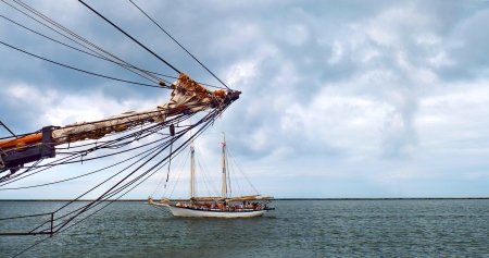 Two sailing vessels Approaching Each Other  One is heading to the deep sea, and another - to the port  The composition is made so that there will be enough room for your text of any kind のeditorial素材