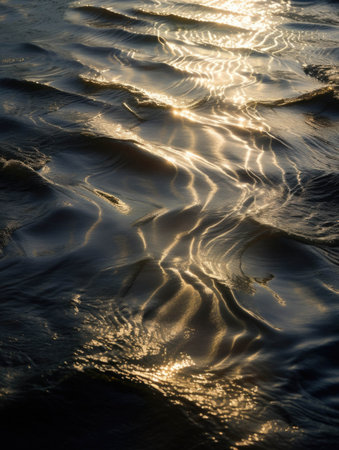 The soft rippling waters are illuminated by the sunâs rays as they dance off microorganisms.. AI generationの素材