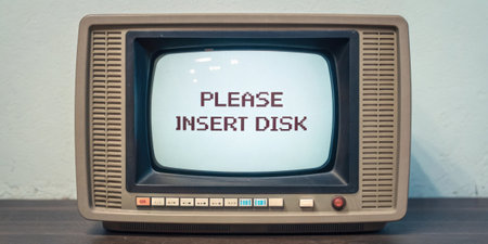 Chunky Borders A vintage monitor with thick rounded edges displays a bright white dialogue box in the center surrounded by a pixelated border. The text inside reads Please Insert.の素材