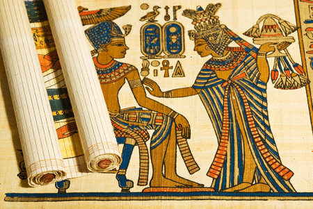 Anticient egyptian papyrus and scroll showing traditional drawings