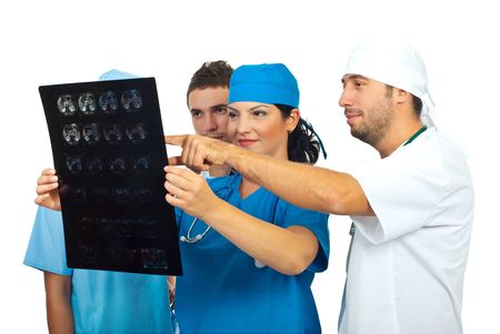 Four doctors  team having a discussion and review a magnetic resonance imaging isolated on white backgroundの写真素材