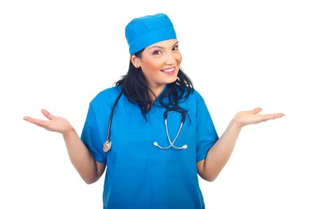 Expressive surgeon woman questioning and smiling isolated on white backgroundの写真素材
