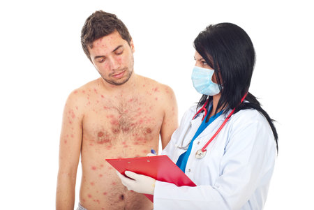 Doctor woman with mask giving prescription to a sick patient man with chickenpox isolated on white...