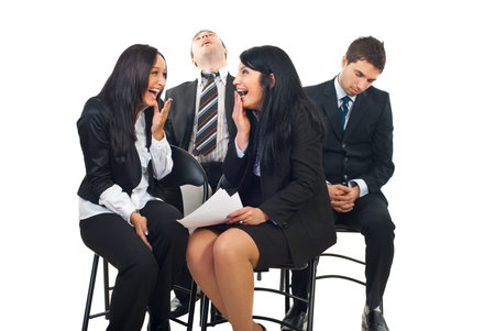 Two business men fell asleep and snoring at the conference and two busines women laughing out loud  ...
