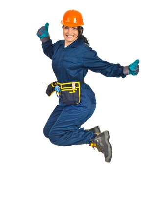 Successful happy worker woman jumping isolated on white backgroundの写真素材