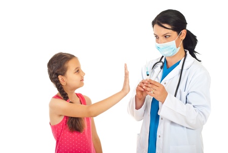 Girl gesturing stop hand to doctorand refuse vaccination  isolated on white backgroundの写真素材