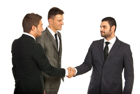 Business men giving handshake at meeting isolated on white backgroundの写真素材