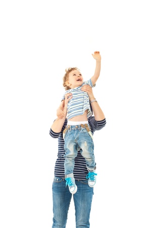 Mother raising up toddler boy to catch something isolated on white backgroundの写真素材