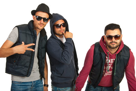 Group of three break dancers men with sunglasses gesturing isolated on white background