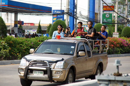 CHIANGMAI,THAILAND-APRIL 14, 2011:Unidentified tourist with pickup car in a water fight festival or Songkran Festival Thai New Year, on April 14, 2011 in Chiangmai, Thailand.のeditorial素材