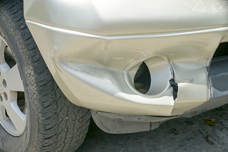 A dent on the right front of a pickup truck damage from crash accidentの写真素材