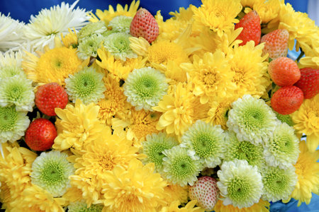 Chrysanthemum flowers arranged with strawberry for decoration concept