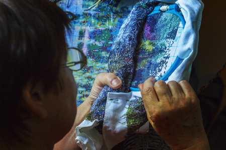 hand with needle embroideryの写真素材