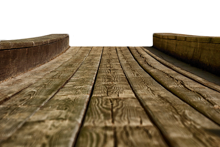empty wooden table top isolated on white background, used for display or montage your productsの写真素材