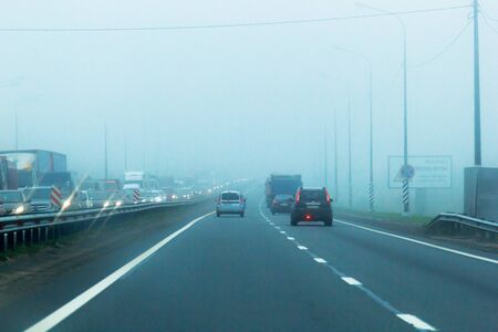 RUSSIA, ST PETERSBURG - AUGUST, 2018: Cars in the fog.のeditorial素材