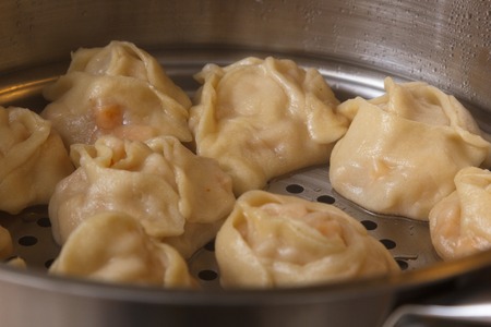 manti with pumpkin veggie, healthy food, steamed. mantyshnitsa hotの写真素材