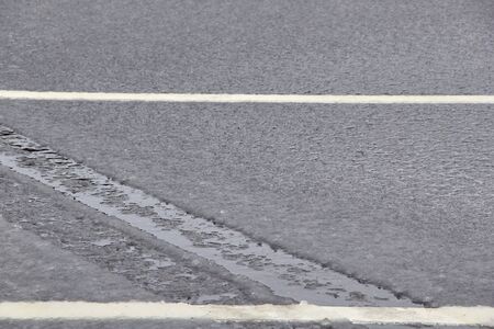 slush dampness on the road sleet even layer.の写真素材