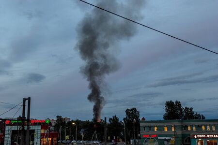 St. Petersburg, Russia-June 2019: building fire on a busy street, in the evening.のeditorial素材