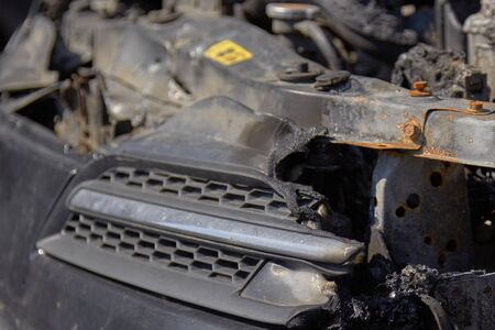 city burned cars after a fire in one of the citys districtsの写真素材