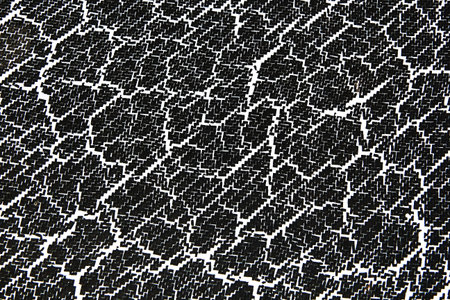 texture of dark paint with the effect of cracking coating.