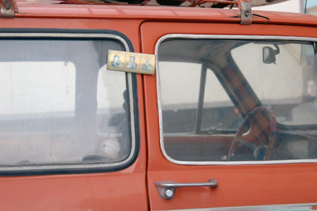 Russia, Saint-Petersburg, July 2019:Safety of a vehicle with a mounted icon of Holy people.