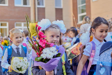Russia, Saint-Petersburg, September 2019: first of September back to school children went to school for the first time in their lives.のeditorial素材