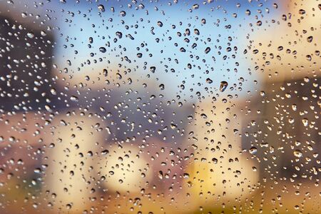 Big drops of rain on the windshield of a car abstract background. Selective photos.の写真素材