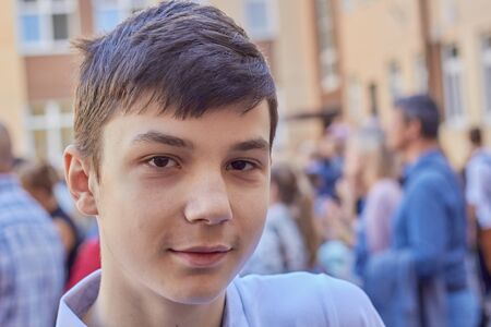 portrait of a teenage schoolboy, close-up, back to school 14 yearsの写真素材