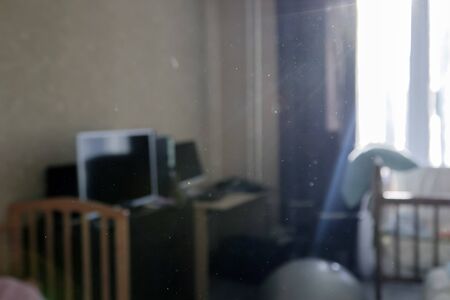 blurred background dust in the house in the sun against the of an ordinary living room.の写真素材