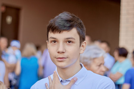 portrait of a teenage schoolboy, close-up, back to school 14 years