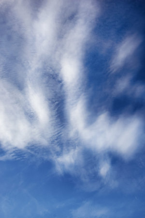 Blue sky background with white high clouds Altostratus Cirrocumulus, Cirrus.