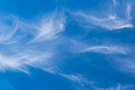 plumose clouds of the top tier in blue space of the sky.の写真素材