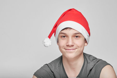 teen is ready for the new year in Santas hat