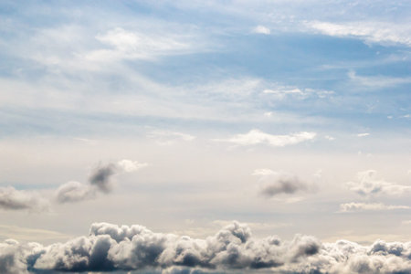 multi-colored layered clouds of the lower tier