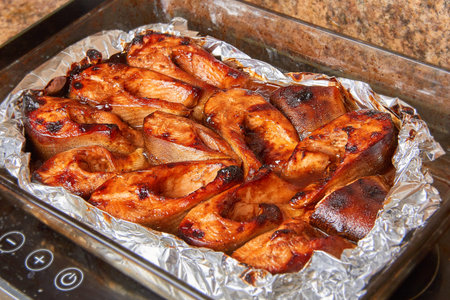 baked red fish in a marinade of teriyaki sauce.