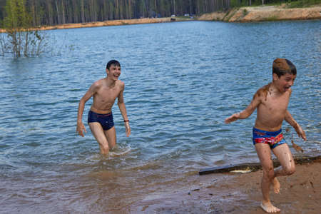 splashing water in the lake in nature entertainment.の写真素材