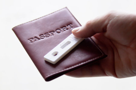 Test cassette on passport, travel in the time of Coronavirus, antibody testing upon arrival or...