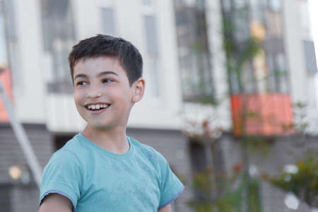 Boy in the city, city life, summer portrait.の写真素材
