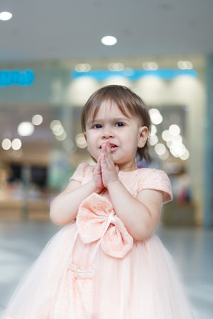 Surprised baby, Wow. in store, baby saw plush toy.の写真素材