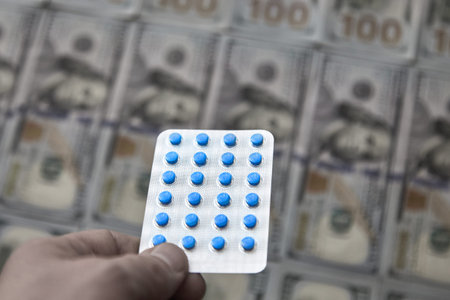 tablets close-up on the background of dollars