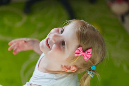 A child blows bubbles, children play with soap bubblesの写真素材