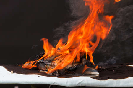 Fire caused by faulty electrical wiring in ironの写真素材