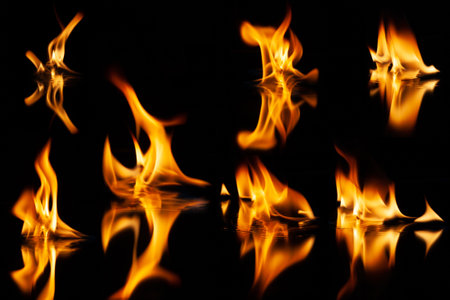 fire flame with reflection in the glass on a black backgroundの写真素材