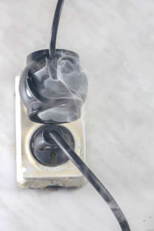 Short circuit of electrical wires sparks molten wires, fire from electrical wiring, blurred photo, concept blurred background, selective focusの写真素材